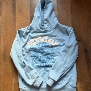 SP5DER Light Blue Hoodie with Spiderweb Graphic